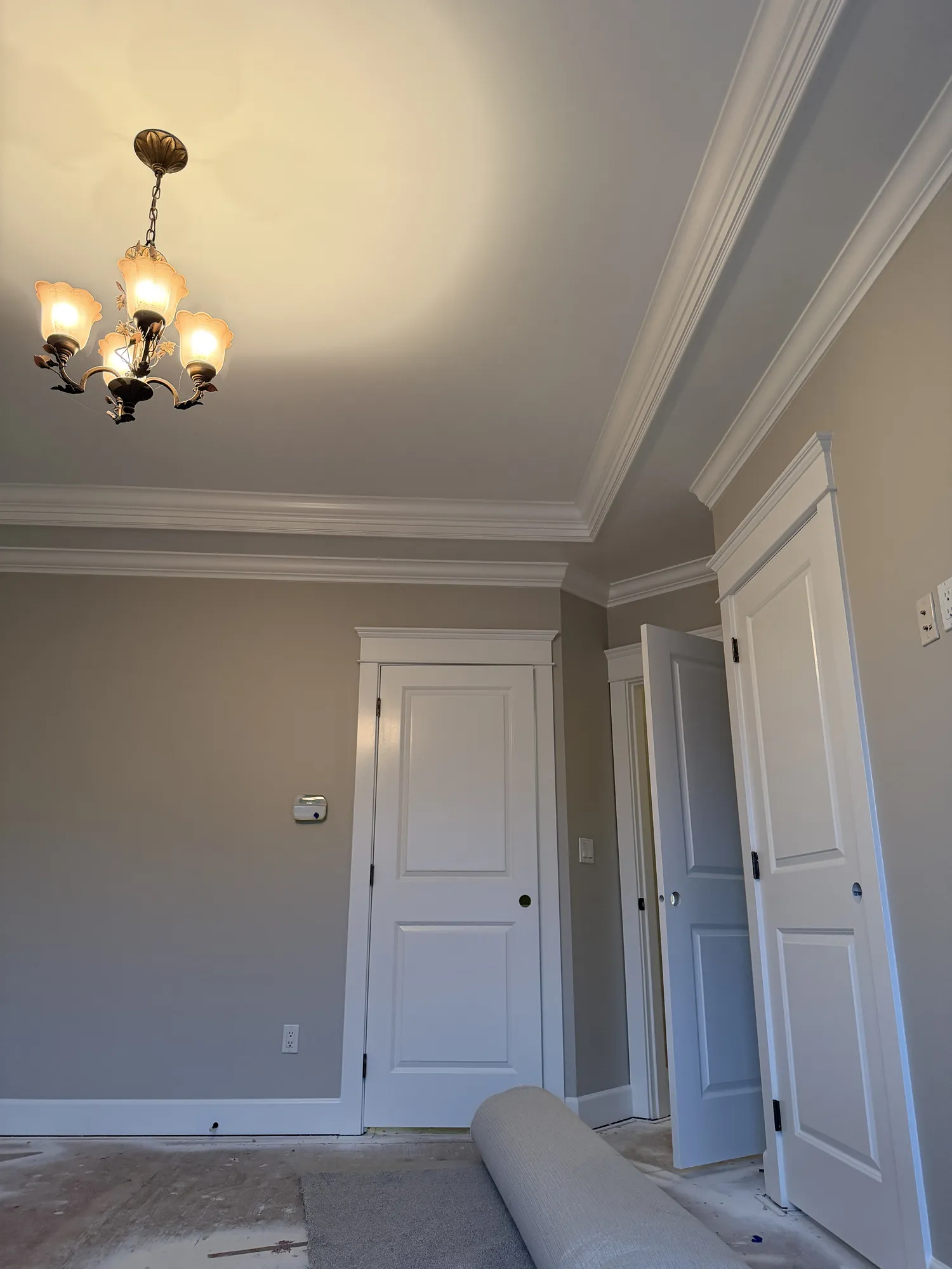 Finished residential room with smooth walls and crisp trim