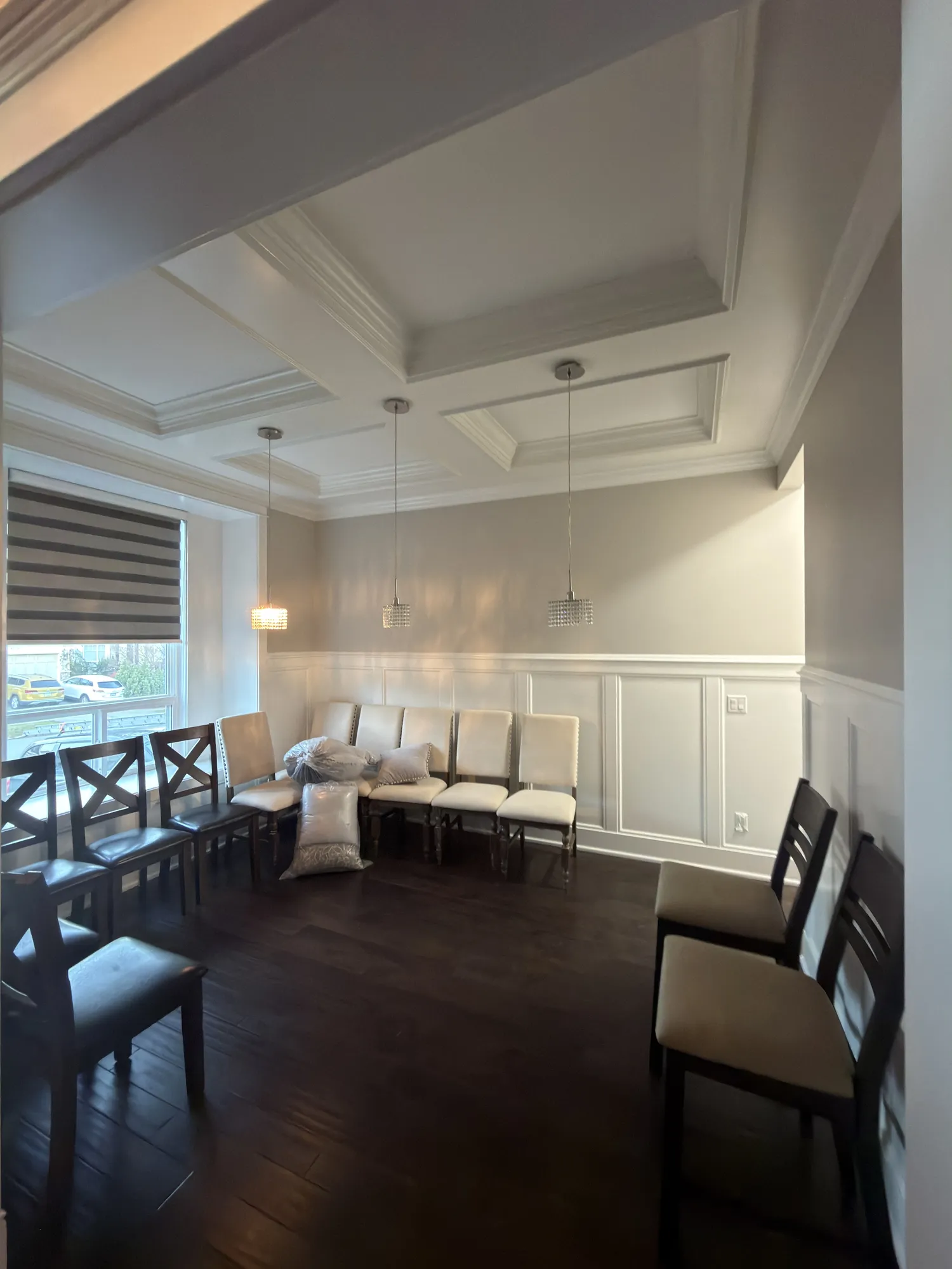Dining area with detailed ceiling and wall finish